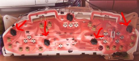 1998 Ford Taurus - Rear view of a vehicle's instrument cluster circuit board, showing the intricate wiring and components.