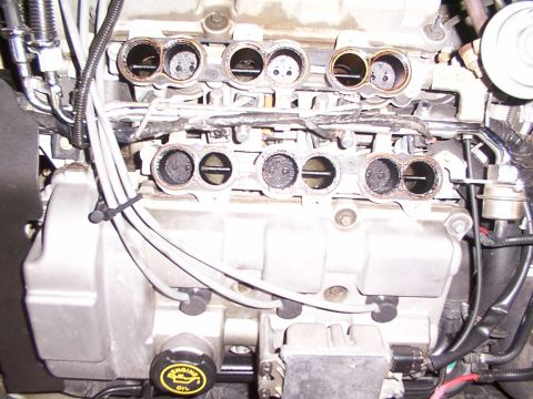 1998 Ford Taurus - Pic of the Intake on the lower manifold. Great shot of secondaries closed.