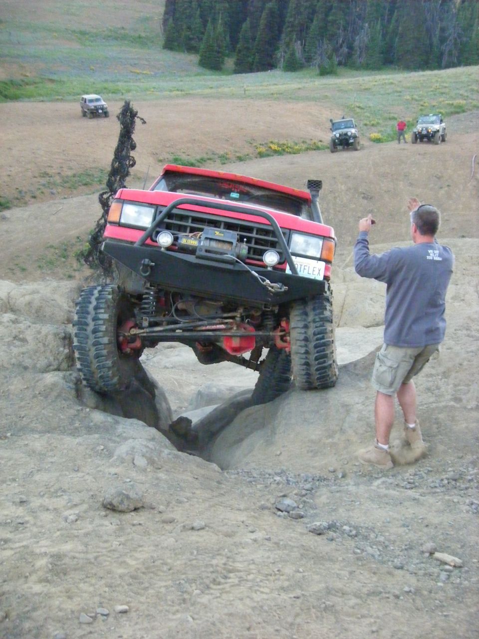 Jon almost up the V-notch with Greg spotting