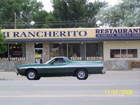 1973 Ford Mustang - A green 1970s era pickup truck with a silver stripe runs along the side, parked in front of a restaurant called "Mi Rancherito Restaurant A…
