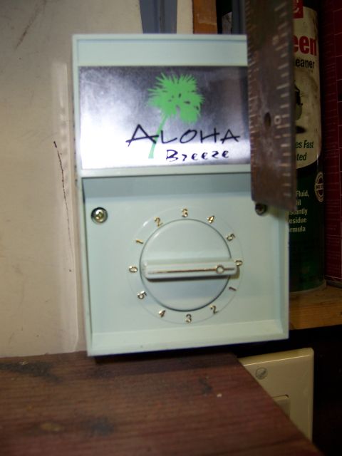 1991 Ford Bronco - Photograph of an Aloha Breeze rotary fan speed controller mounted on a garage wall.