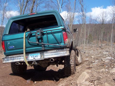 1996 Ford Bronco - This 1996 Ford Bronco is seen from the rear, equipped with a spare tire carrier and a license plate reading 979 WAZ.