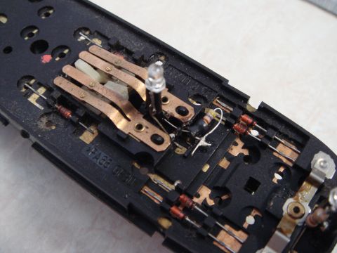 1998 Volvo V70 - Circuit board with electronic components, including LEDs and resistors, showing some wear.