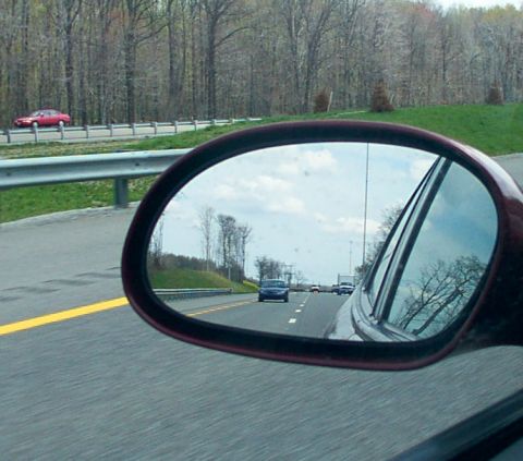 1998 Ford Taurus - View of the road and other vehicles from the side mirror.