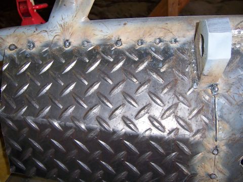 1991 Ford Bronco - Custom metal fabrication with diamond plate and welded components.