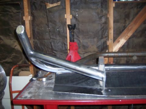 1991 Ford Bronco - A custom steel tube front bumper is being fabricated, showing the curved section and mounting brackets.