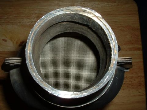 1992 Ford Probe - This is a close-up view of a mass air flow sensor, likely removed for cleaning or replacement.