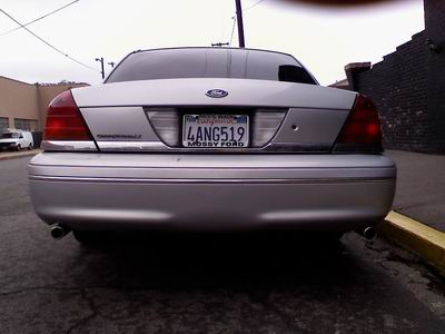1998 Ford Crown Victoria - Rear view of a 1998 Ford Crown Victoria, showing its taillights and license plate.