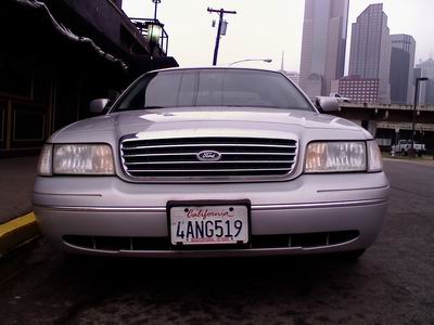 1998 Ford Crown Victoria - Front view of a silver 1998 Ford Crown Victoria with a California license plate.