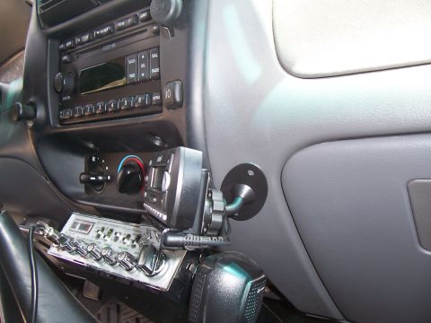 2003 Ford Ranger - Interior view of a 2003 Ford Ranger, highlighting the dashboard with a CD player and an installed CB radio.