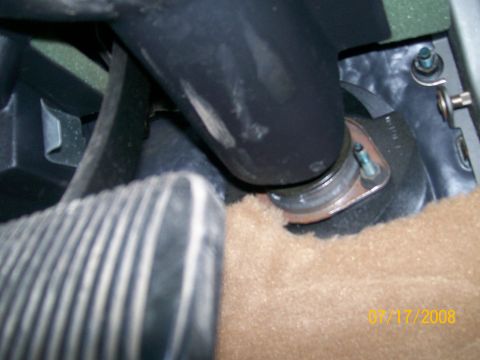 1995 Mercury Grand Marquis - Interior view of steering column and pedals, likely from a sedan.