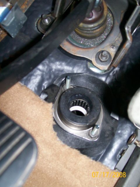 1995 Mercury Grand Marquis - A close-up view of the steering column's bearing assembly, showing internal components and mounting hardware.