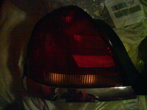 2003 Ford Crown Victoria - A single car taillight is shown, possibly for replacement or repair.
