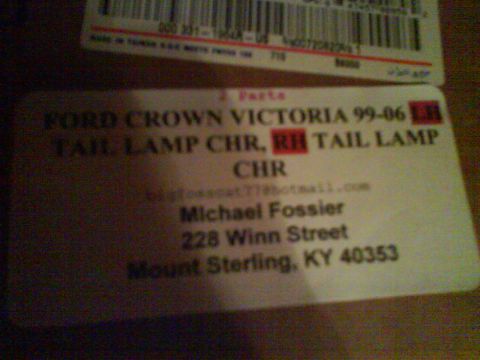 2003 Ford Crown Victoria - Part label for a 1999-2006 Ford Crown Victoria tail lamp, listing part details and seller information.