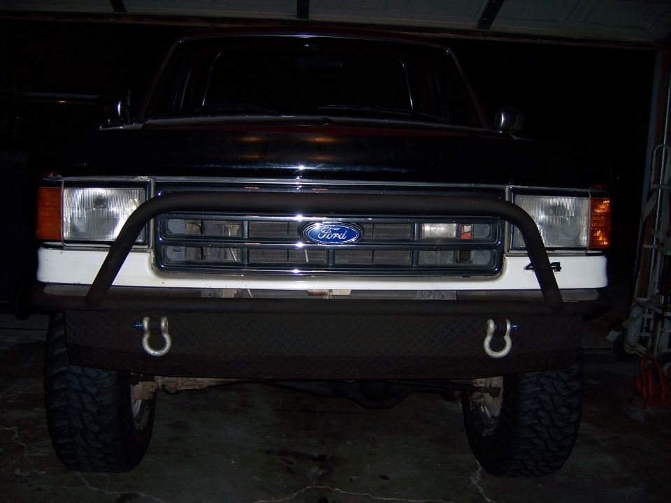 1991 Ford Bronco front bumper with tow hooks and Ford grille
