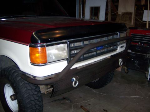 1991 Ford Bronco - Custom fabricated front bumper with tow hooks is fitted to a two-tone truck.