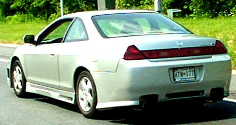 1998 Ford Taurus - Rear view of a silver 1998 Honda Accord coupe with custom side skirts.