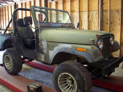 1978 Jeep CJ5 - This 1978 Jeep CJ5 is on a lift, undergoing some work or restoration.