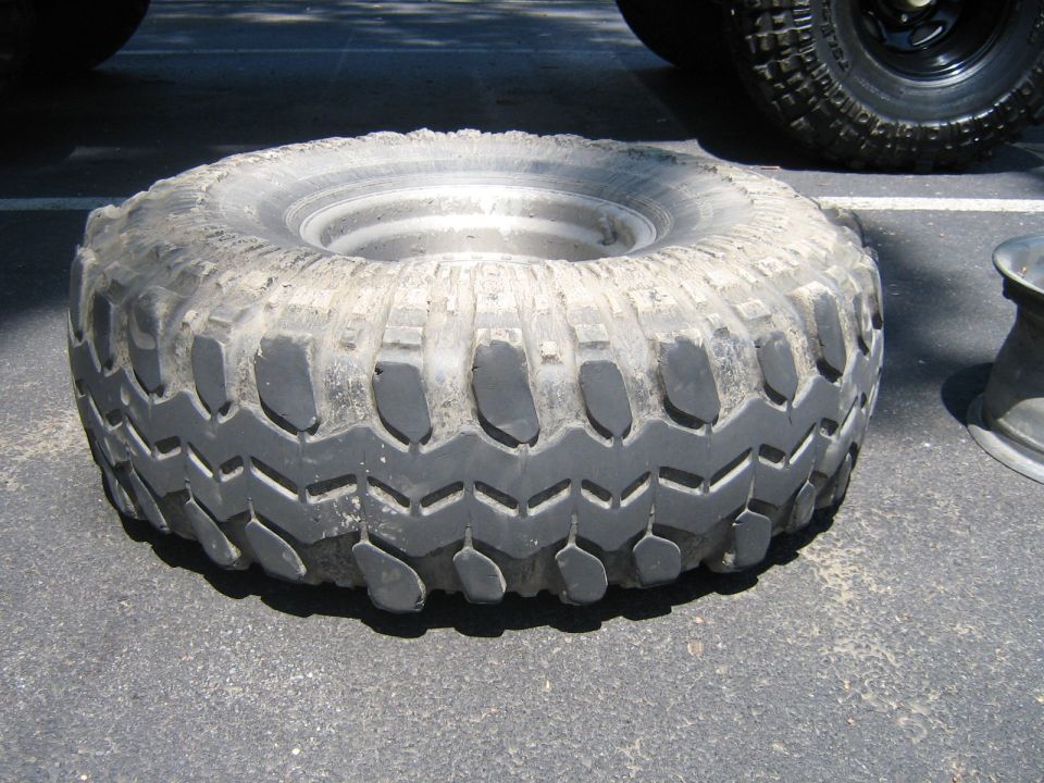 Tire with aggressive tread pattern on asphalt