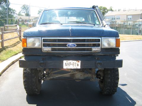 1990 Ford Bronco - Front view of a 1990 Ford Bronco equipped with a snorkel and custom bumper.