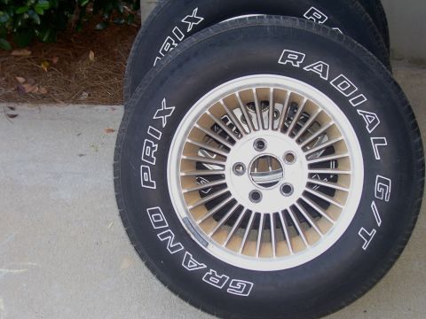 1979 Chevrolet Camaro - Wheels and tires are stacked, with visible text on the tires.
