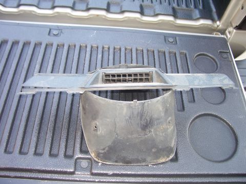 1979 Chevrolet Camaro - Dashboard trim part with vent detail, photographed on a truck bed.