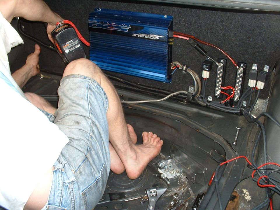 me installing power panel with amp (because you always need tunes)