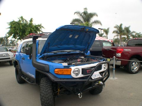 2007 Toyota FJ Cruiser - A blue 2007 Toyota FJ Cruiser is displayed with its hood open, its engine and snorkel accessory.