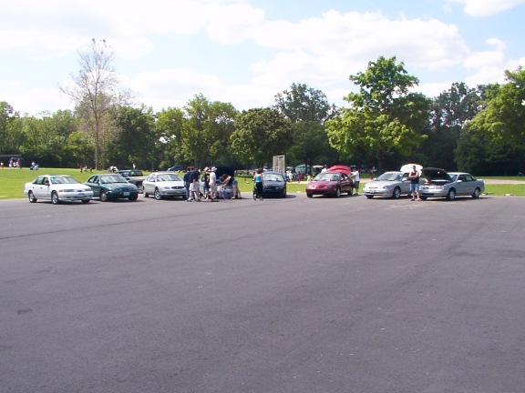 1998 Ford Taurus parked with other cars