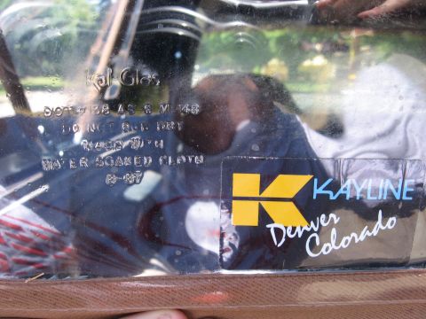 1989 Ford Bronco - Close-up of a Kal-Glas soft top showing care instructions and a Kayline sticker from Denver, Colorado, with a date code of 8-87.