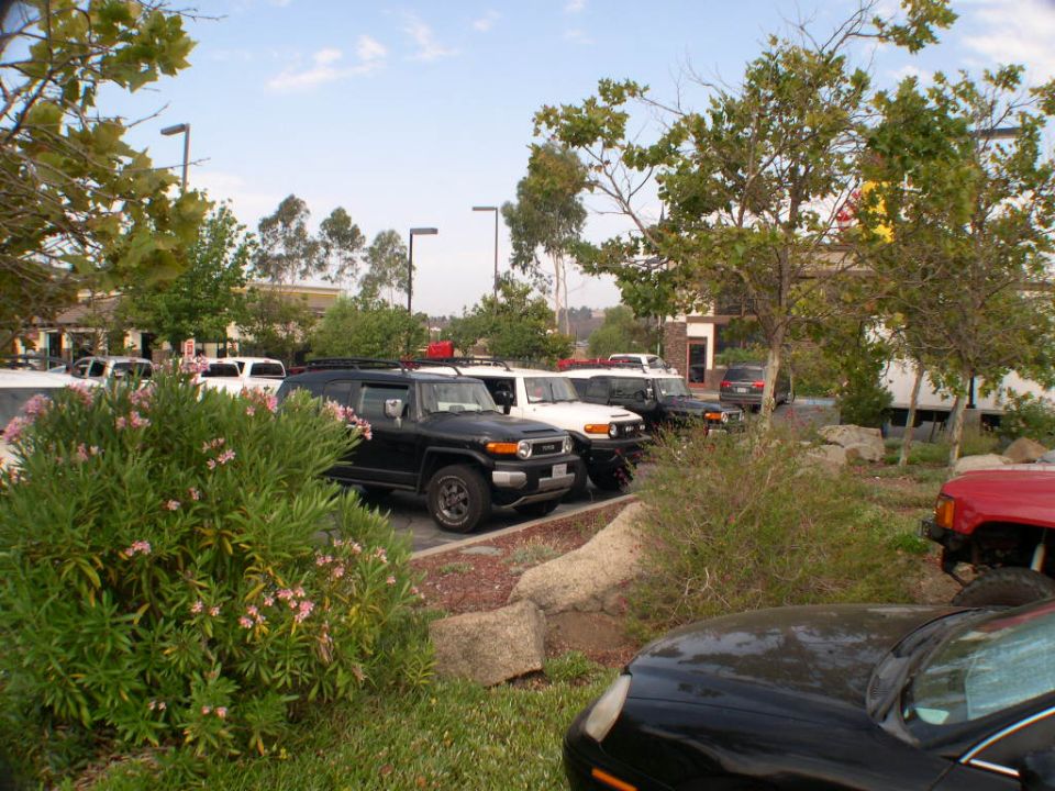 Black 2007 Toyota FJ Cruiser parked in a lot, front 3/4 view