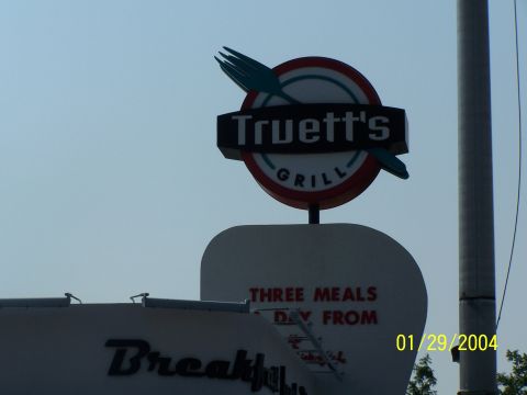 1979 Ford F-150 - A sign for Truett's Grill is visible against a clear sky, with a date stamp of 01/29/2004.