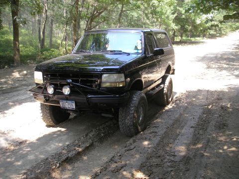1995 Ford Bronco - This 1995 Ford Bronco is equipped with off-road tires and a custom front bumper.