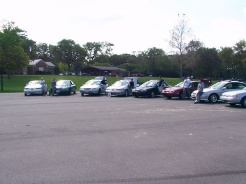 1998 Ford Taurus - All lined up and driver next to their cars. left to right...Alex Perry, Twlight Sable, Dant98, Tara, Elcapitan, Night Rider, "The UnKnown S…