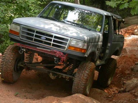 1990 Ford Bronco - This modified Ford Bronco appears to be from the early to mid-1990s, not a 1990 model, as indicated by its grille design.
