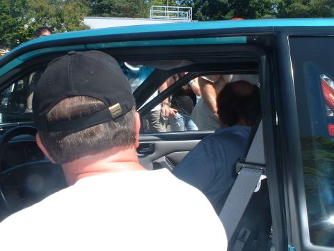 2000 Ford Crown Victoria - View from inside a car with a roll cage, looking towards the passenger side.