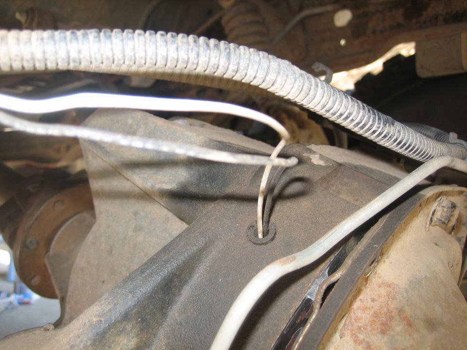 Differential housing with wires entering, 1995 Ford Bronco.