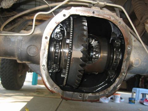 1995 Ford Bronco - The open differential housing of a 1995 Ford Bronco shows the ring gear and spider gears. The differential cover is removed, revealing the…