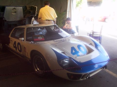 1998 Ford Taurus - A white and blue race car, marked with the number 40, is displayed indoors.