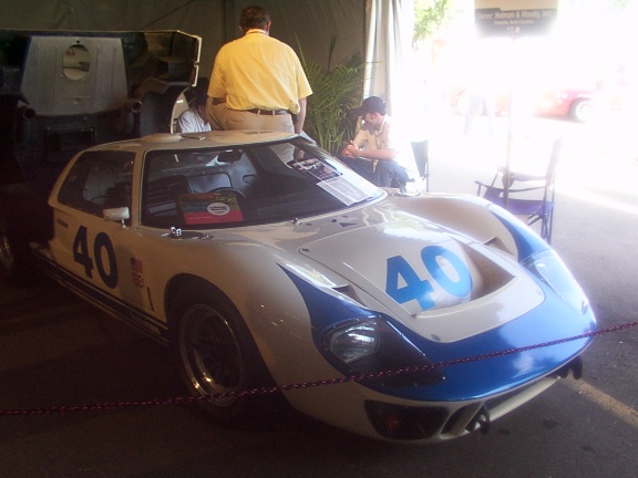 White and blue race car with number 40 on hood and door