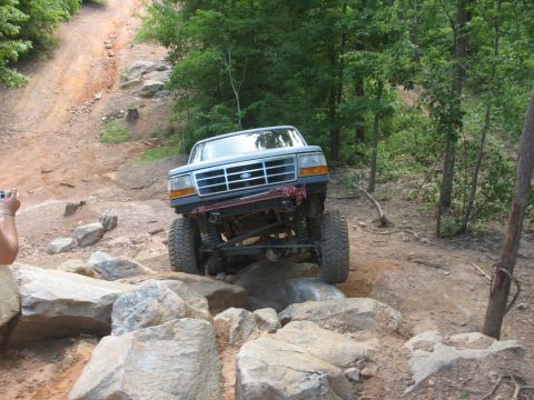 1978 Ford Bronco - Modified Ford F-150 navigates a challenging rocky off-road course.