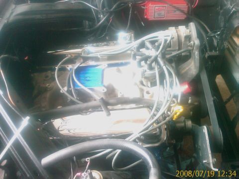 1983 Ford Bronco - Close-up view of an engine bay, showing various components and wiring.
