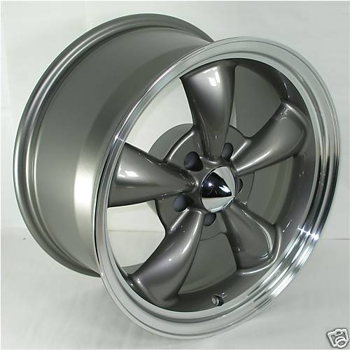 Gray five-spoke wheel with chrome center cap