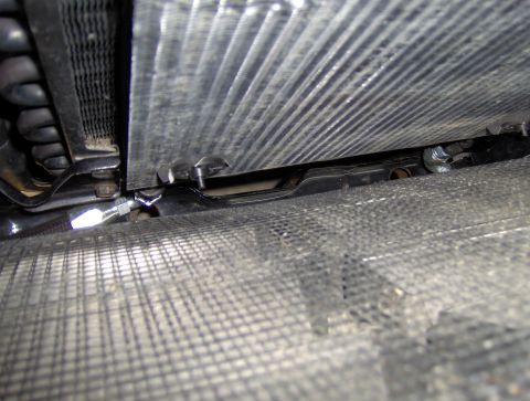 1978 Ford Bronco - Radiator and transmission cooler lines are visible in this close-up view.