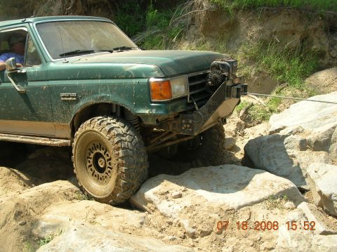1991 Ford F-150 - Ford Bronco tackling a difficult rock crawling course.