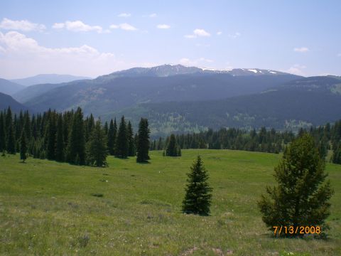 2004 Ford F-150 - A scenic view of mountains and forests under a partly cloudy sky, with a date stamp of 7/13/2008.