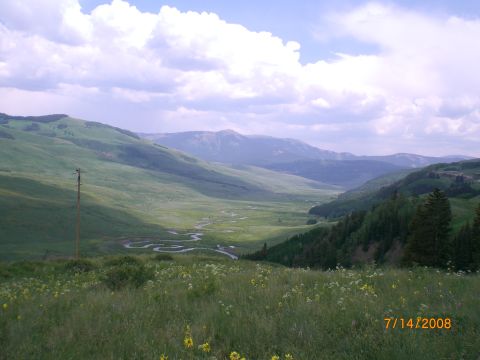 2004 Ford F-150 - Scenic mountain valley landscape with a river and cloudy sky, dated 7/14/2008.