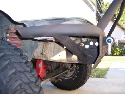 1991 Ford Bronco - Photograph of a tube bumper installed on a vehicle outdoors, not a technical document.