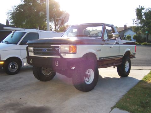 1991 Ford Bronco - Modified 1991 Ford Bronco with aftermarket bumper and lifted suspension.