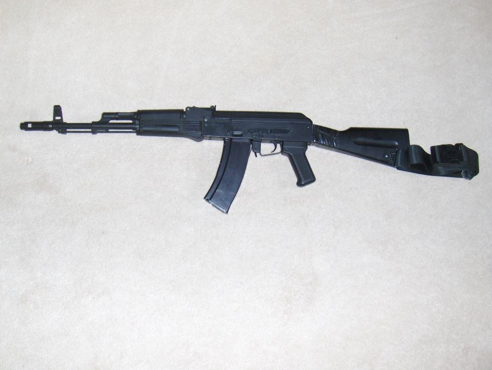 AK-47 style rifle on white background
